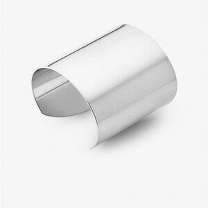 Michael Kors platinum plated bracelet 2.5 inch inner width. Never worn